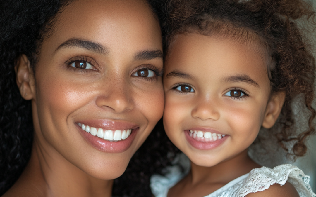 A woman and her child wth beautiful smiles, as a result of practicing preventive dental care